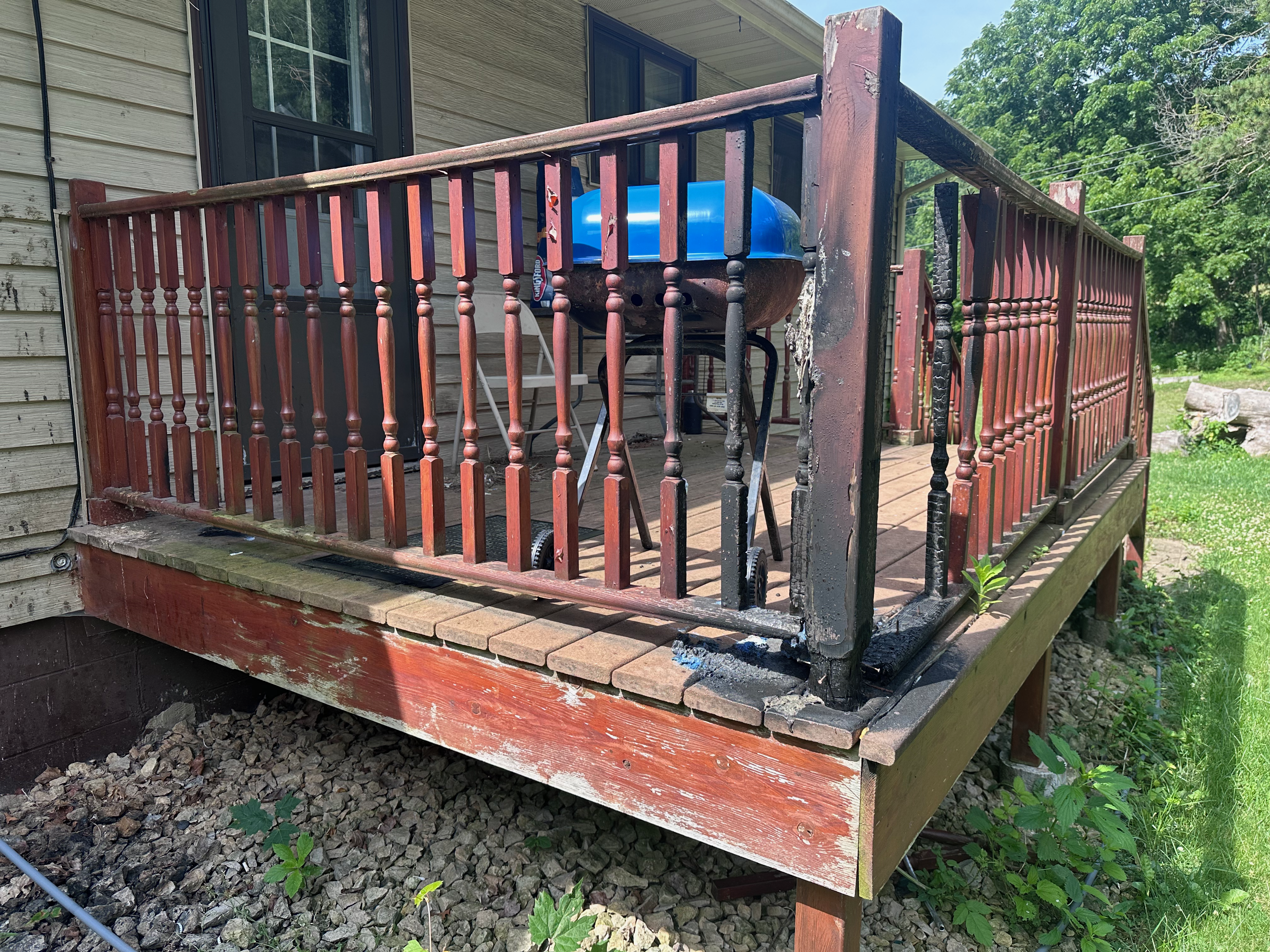 The grill burned up the railing and some floor boards but the joists were solid. Some posts needed to be replaced.